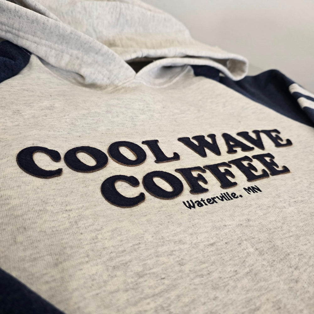 Gray hoodie with 'Cool Wave Coffee' text on a white background