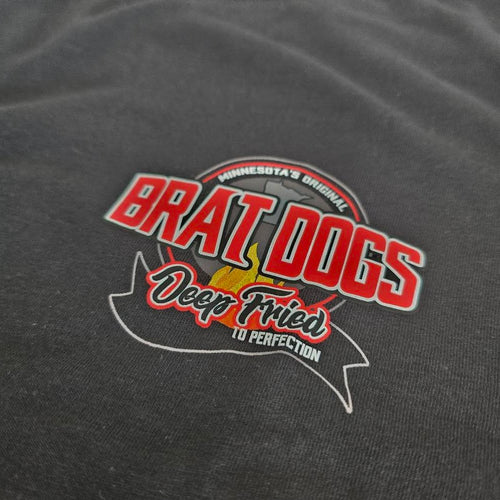 Black t-shirt with 'Brat Dogs' logo featuring red and white text on a dark fabric background.